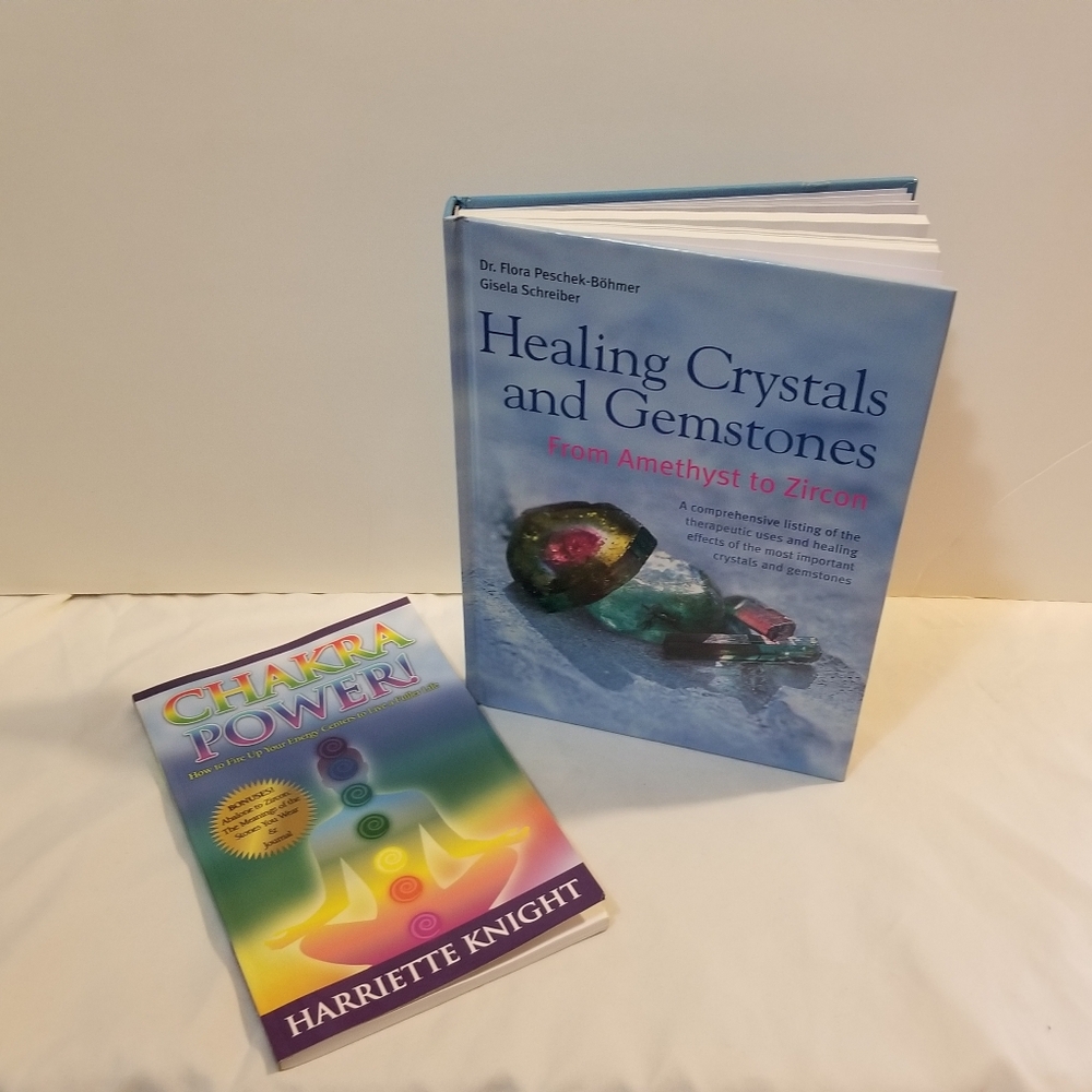 Two books: "Healing Crystals And Gemstones" and "Chakra Power"